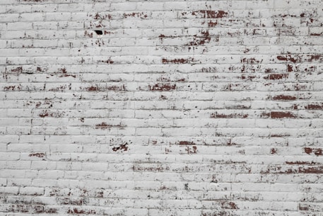 white and brown concrete brick wall