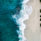 aerial photography of large body of water and shoreline