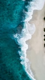 aerial photography of large body of water and shoreline