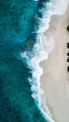 aerial photography of large body of water and shoreline