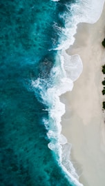 Ocean Waves Crashing on Volcanic Rocks