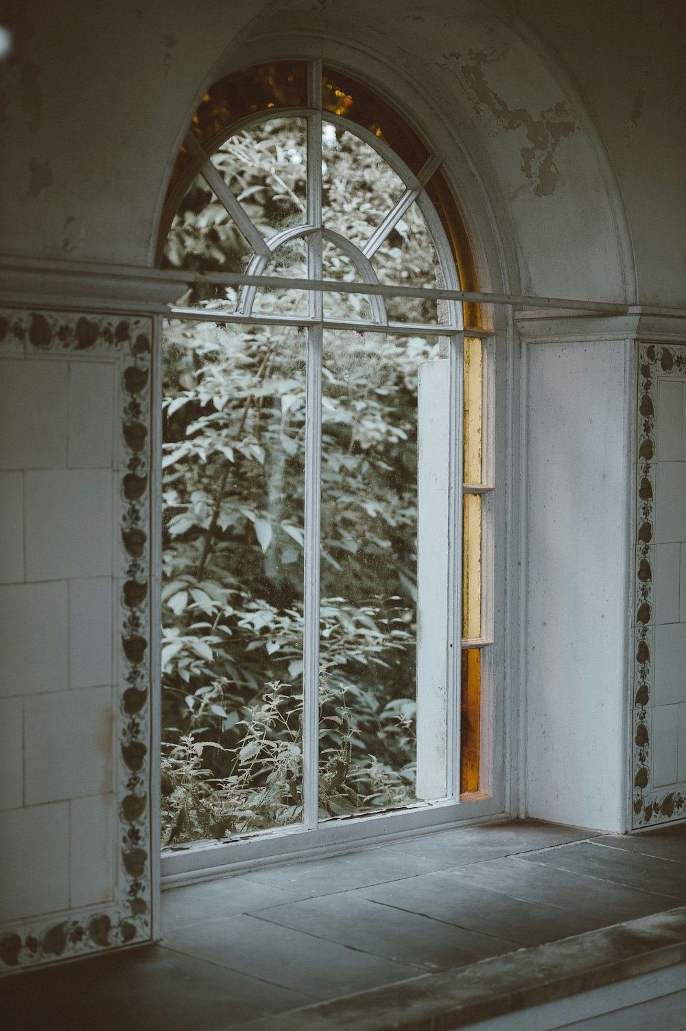 white metal frame clear glass window