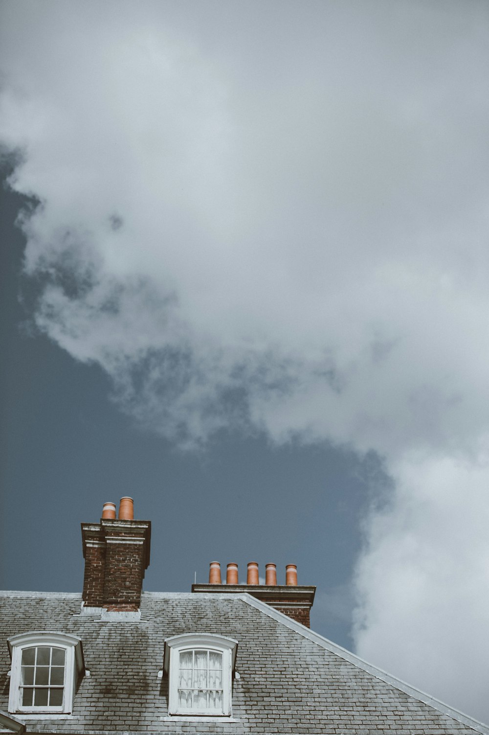 low angle photography of a brown house