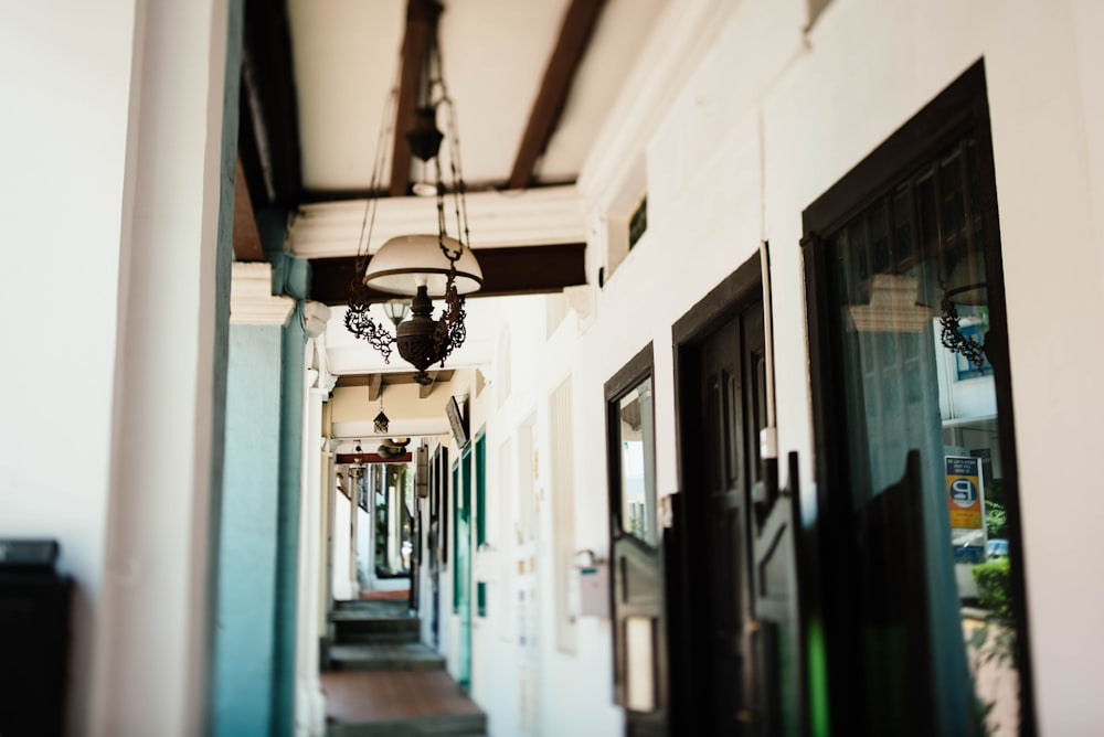 tilt shift photo of clear and black chandelier