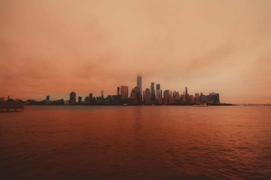 lots of skyscrapers in an island during foggy day in North Cove Yacht Harbor United States