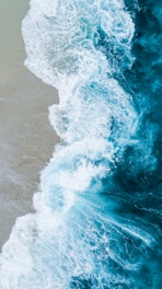 body of water on beach shore