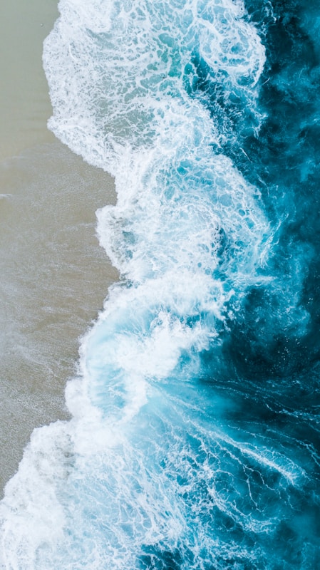 Aerial Ocean Wave on Beach - Frank McKenna