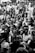 A diverse group of people smiling and engaging in a church gathering, showcasing a sense of community and warmth.