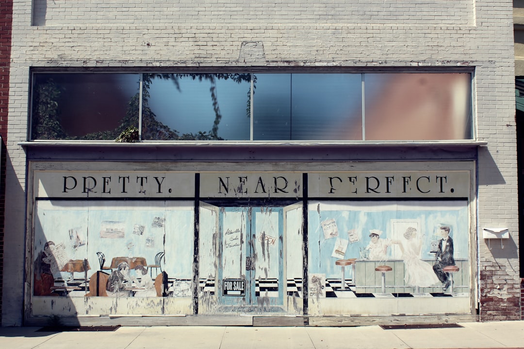 Another abandoned storefront in Abbeville, SC. This one I really love because of the washed-out, muted colors, and the painted scene has the perfect air of nostalgia.