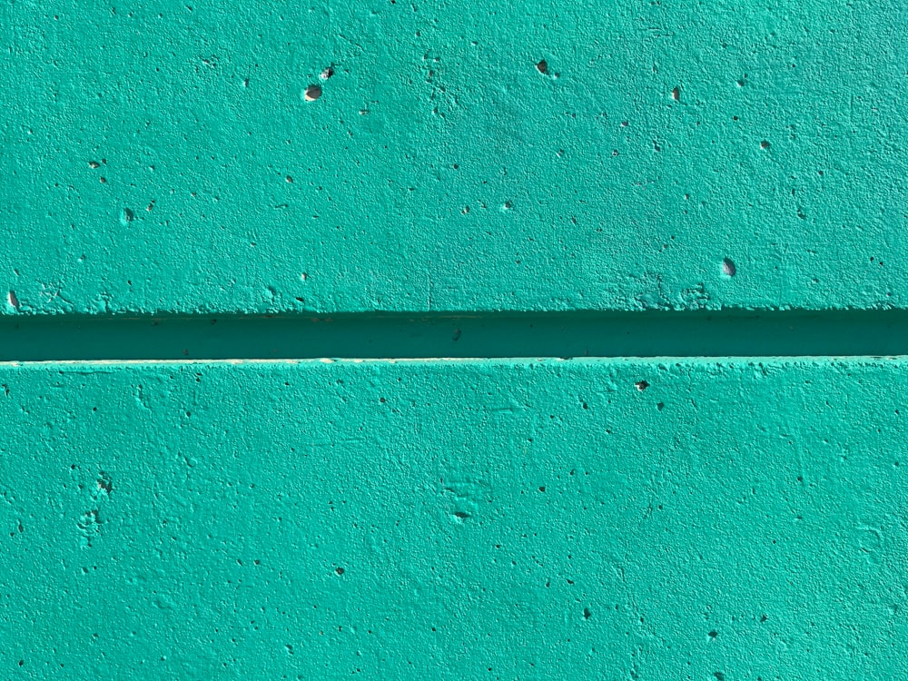 close view of teal color wall