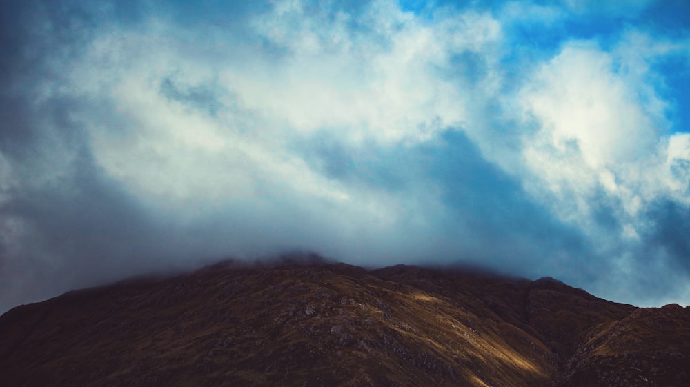 mountain under the clouds