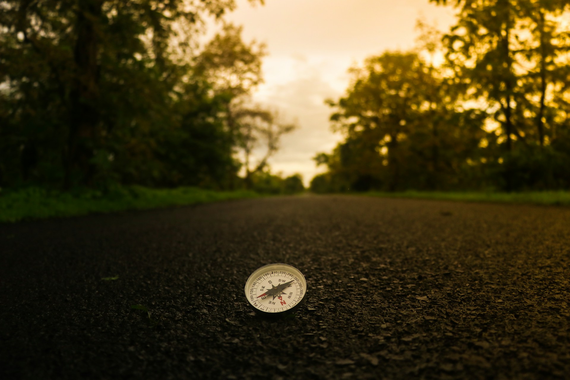 woman wearing yellow long-sleeved dress under white clouds and blue sky during daytime