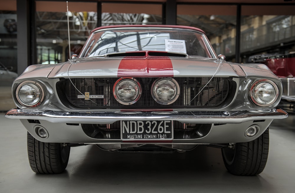 gray and red muscle car