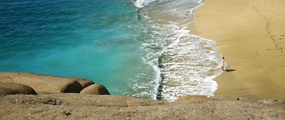 woman standing on seashore