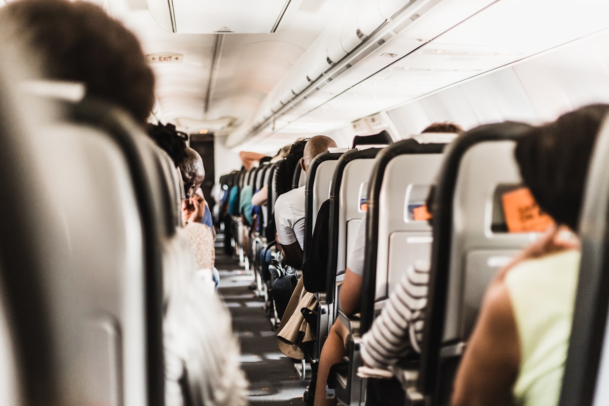 People sitting down on an airplane