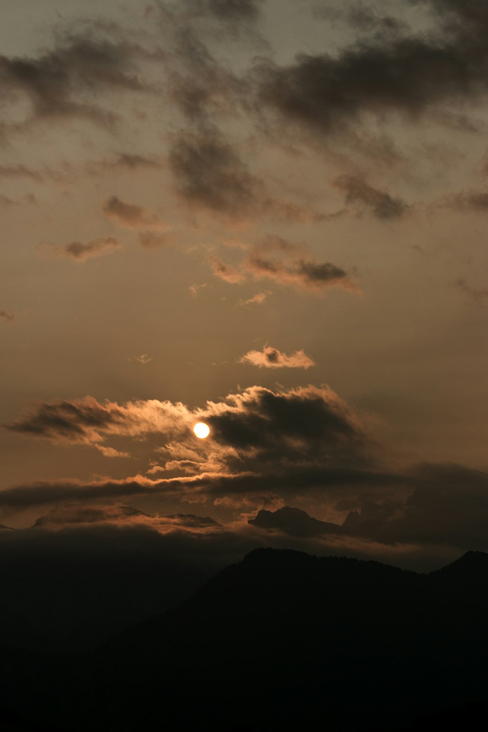 silhouette of mountain during sunset