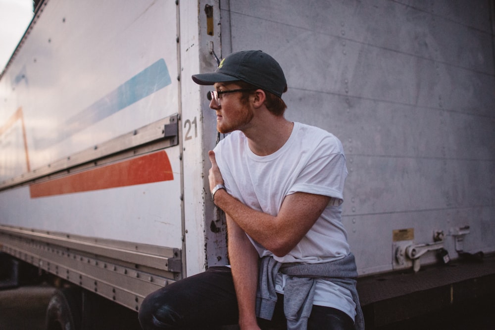 man wearing white crew-neck t-shirt