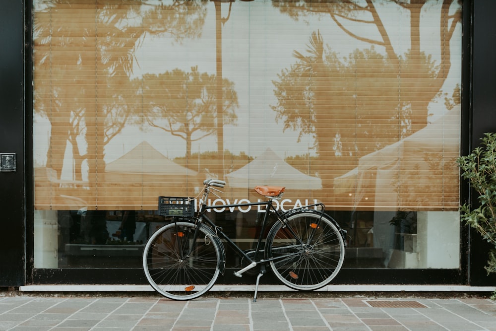 black touring bicycle on the floor