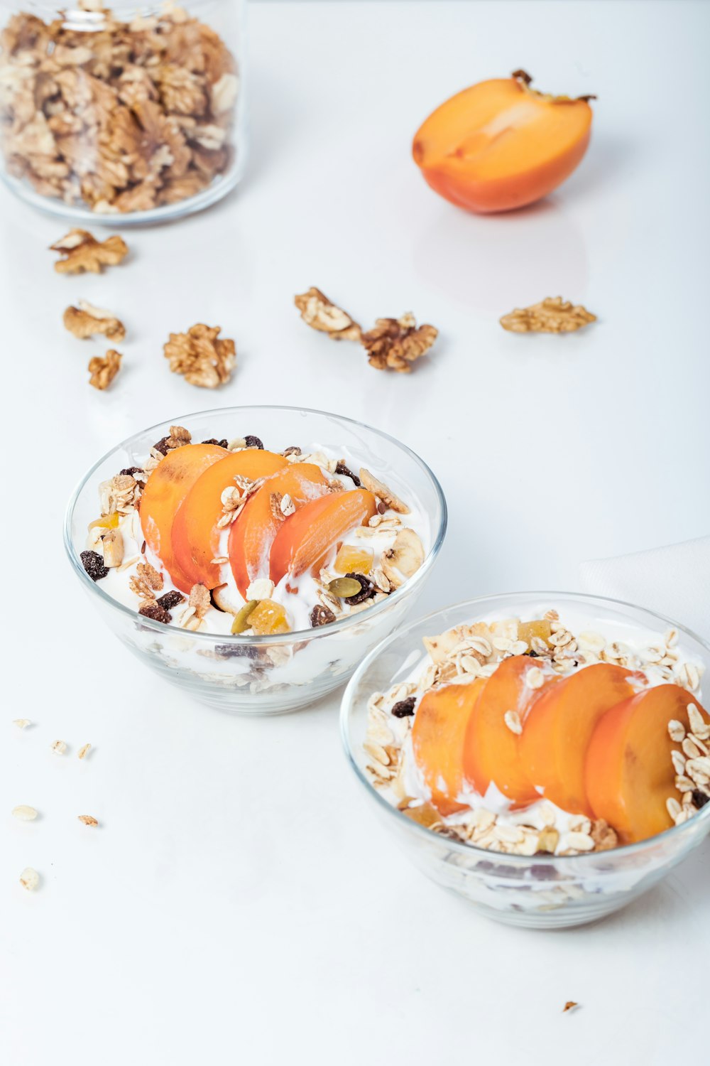 two round glass bowls with food in its