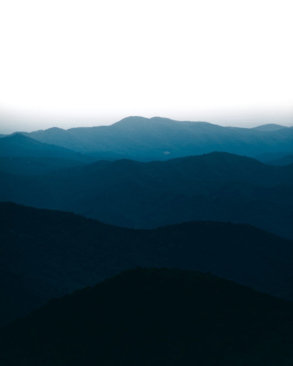 silhouette of mountain during daytime