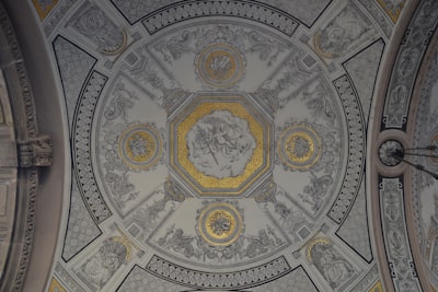 photo of white, gray, and yellow building ceiling decoration google meet background