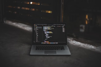 MacBook Pro inside gray room