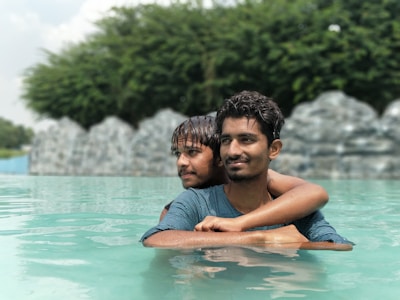 A couple enjoying a quiet swim in a secluded private pool.