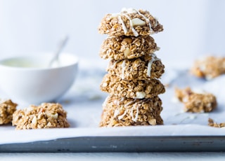 stack of foods beside white ceramic bowl