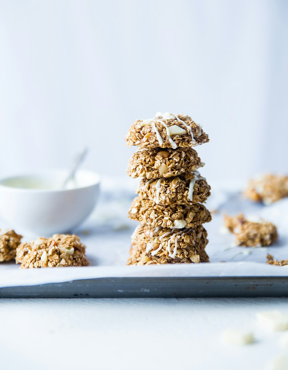 stack of foods beside white ceramic bowl