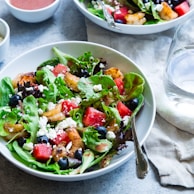 vegetable salad on white ceramic bowl