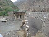 Engineers inspecting transportation infrastructure in a developing area.