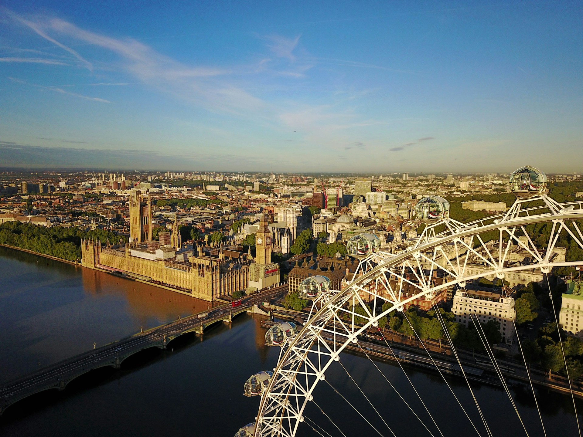 A scenic aerial view of a popular travel destination with clear blue skies and iconic landmarks.