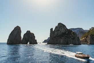 three gray rock formation taken at daytime