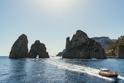 three gray rock formation taken at daytime