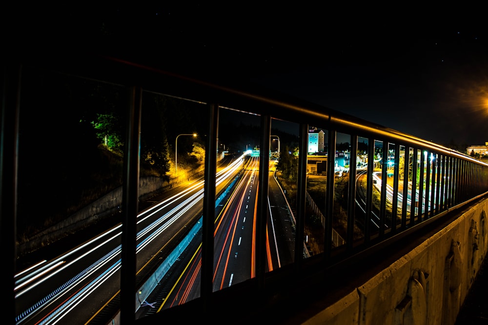time lapse photography of road and cars during nighttime