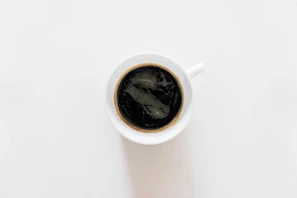 Close-up of a freshly brewed cup of rich, dark coffee from Turfscape’s signature box.