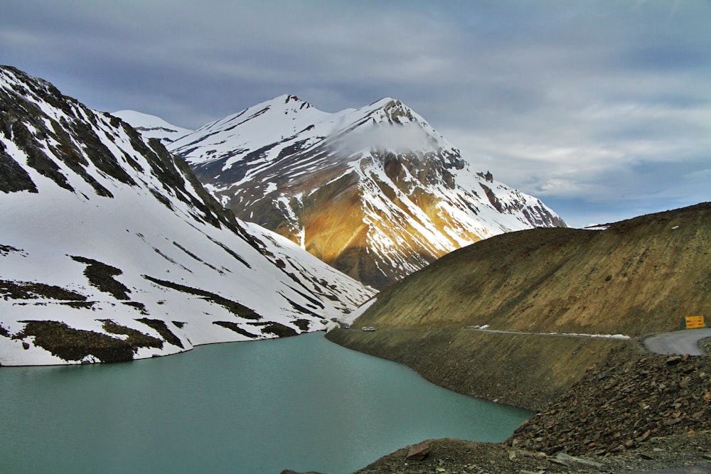 mountain covered by snow during daytime