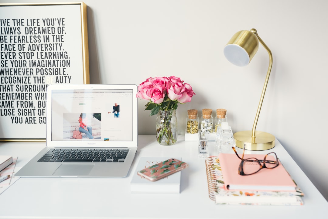 desk with lamp and laptop