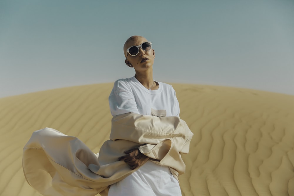 person standing on desert during daytime