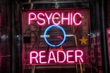 turned on red Psychic Reader neon sign