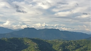A scenic view of a travel destination with mountains.