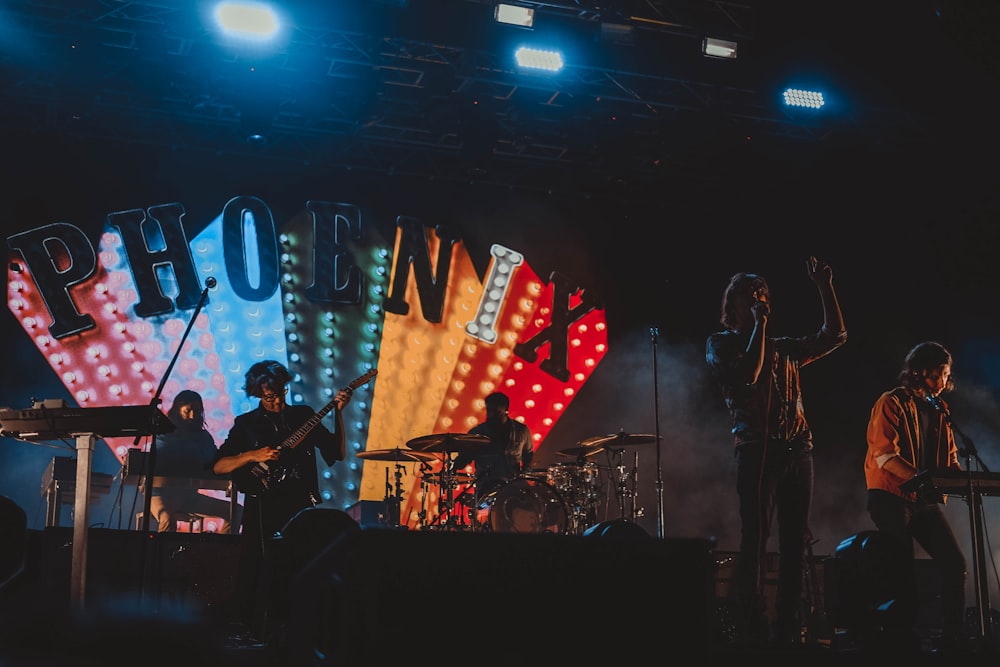 group of band performing on stage