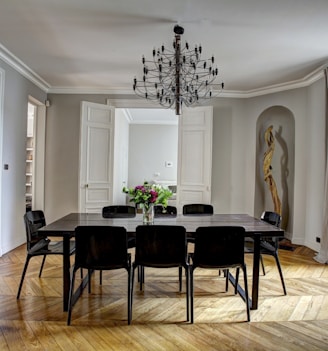 brown wooden dining set inside room