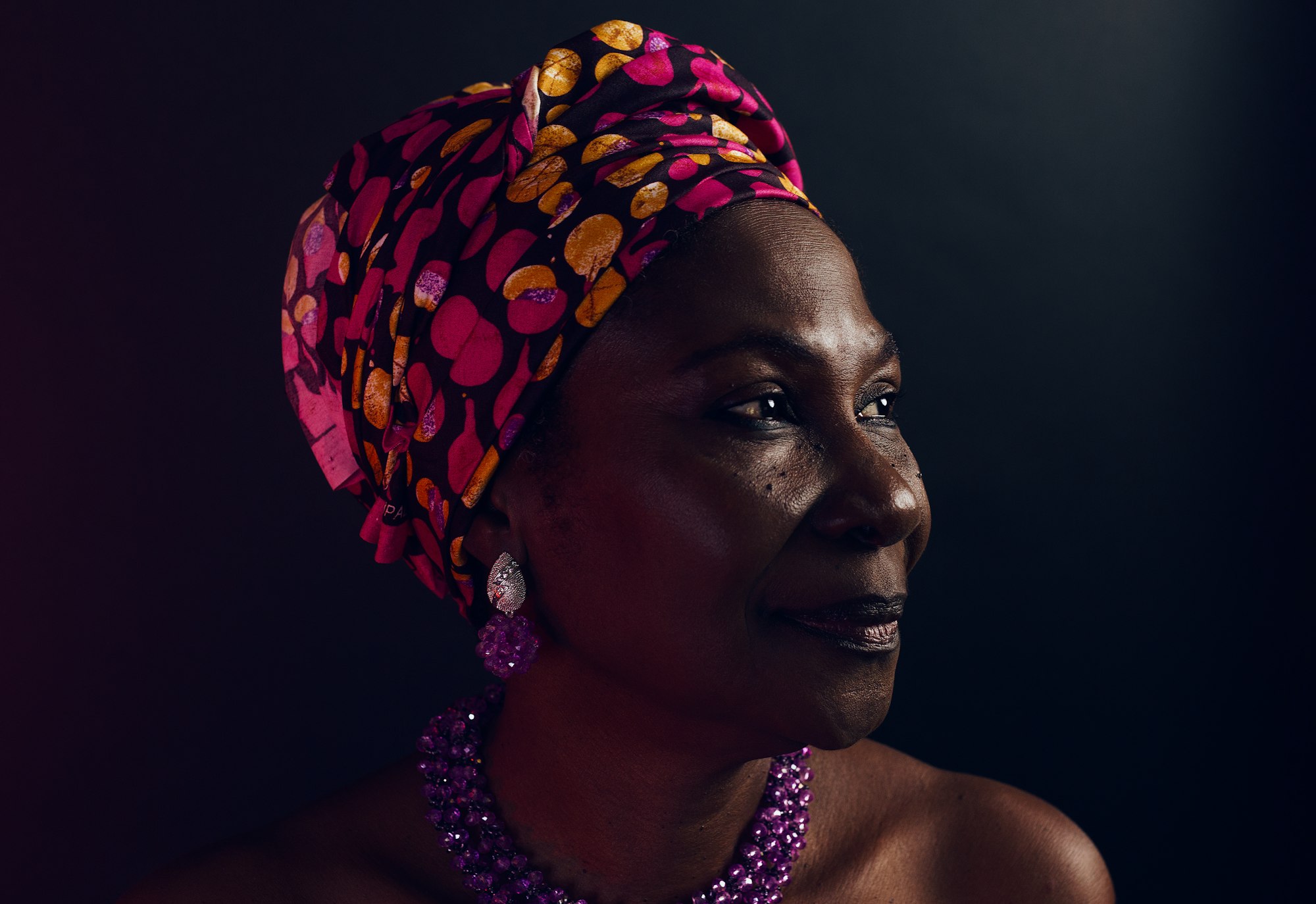 my mom just came to America from Nigeria. she makes jewelry so i wanted to capture her with some of her work on