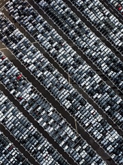 An overhead view of the parking lot highlighting the organized rows of used cars ready for sale.