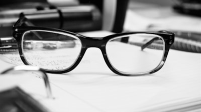 close up photo of black framed eyeglasses