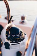 white and black compass pointing at 0 shallow focus photography