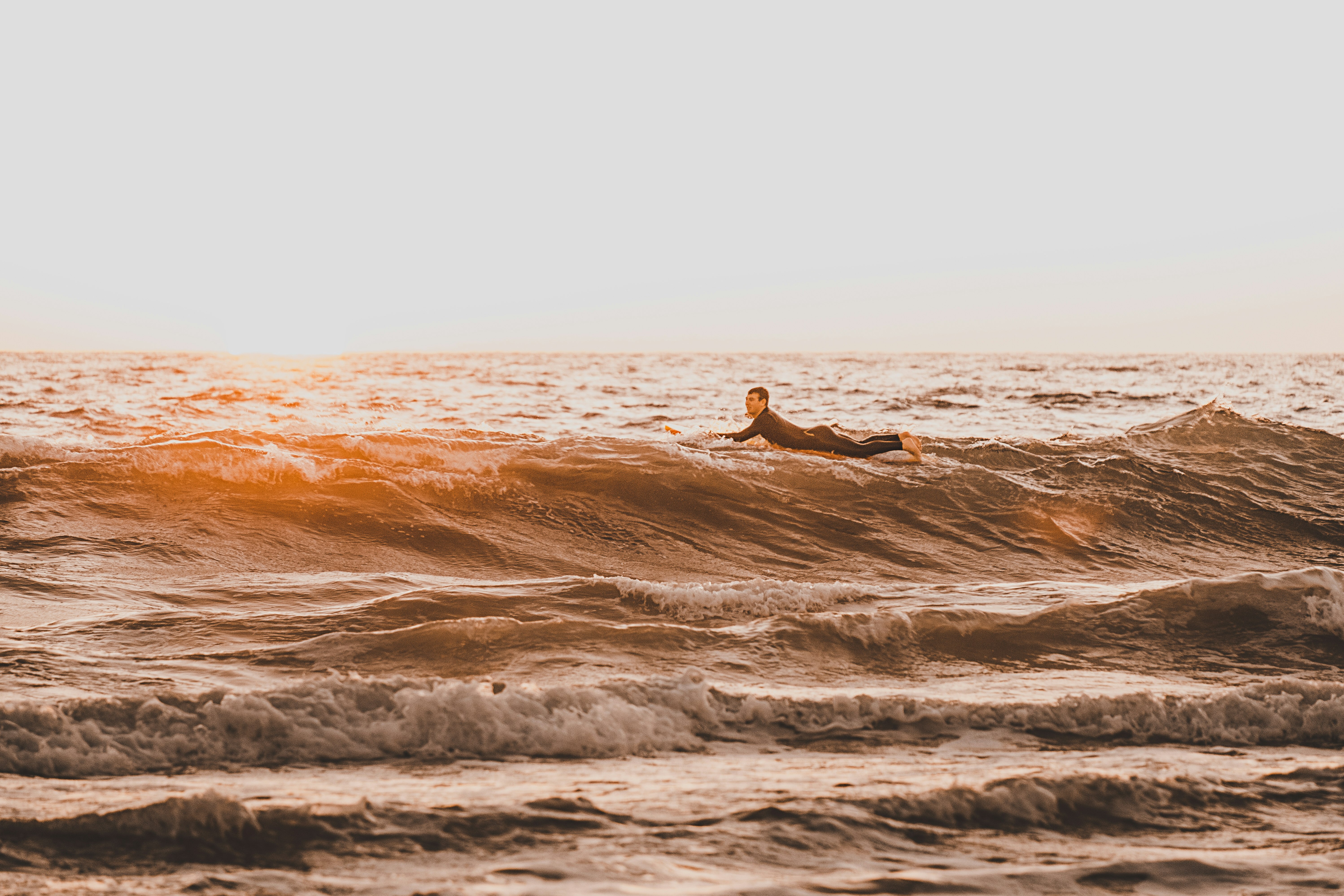 person surfing on water waves