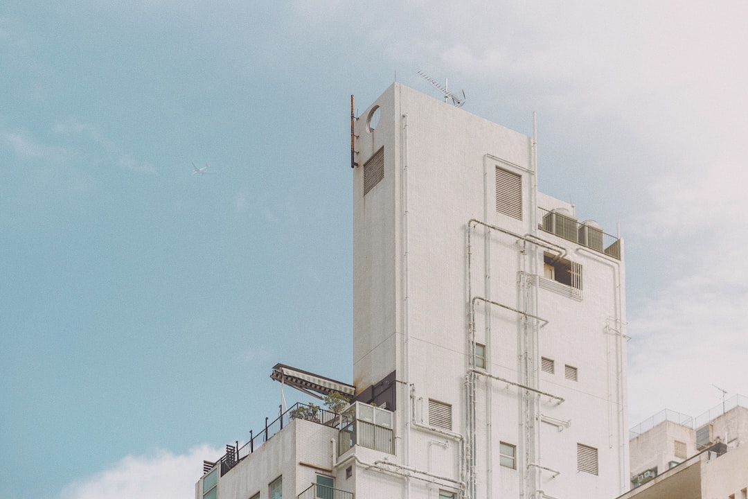 white concrete high rise building