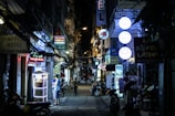 assorted-color concrete stores at night